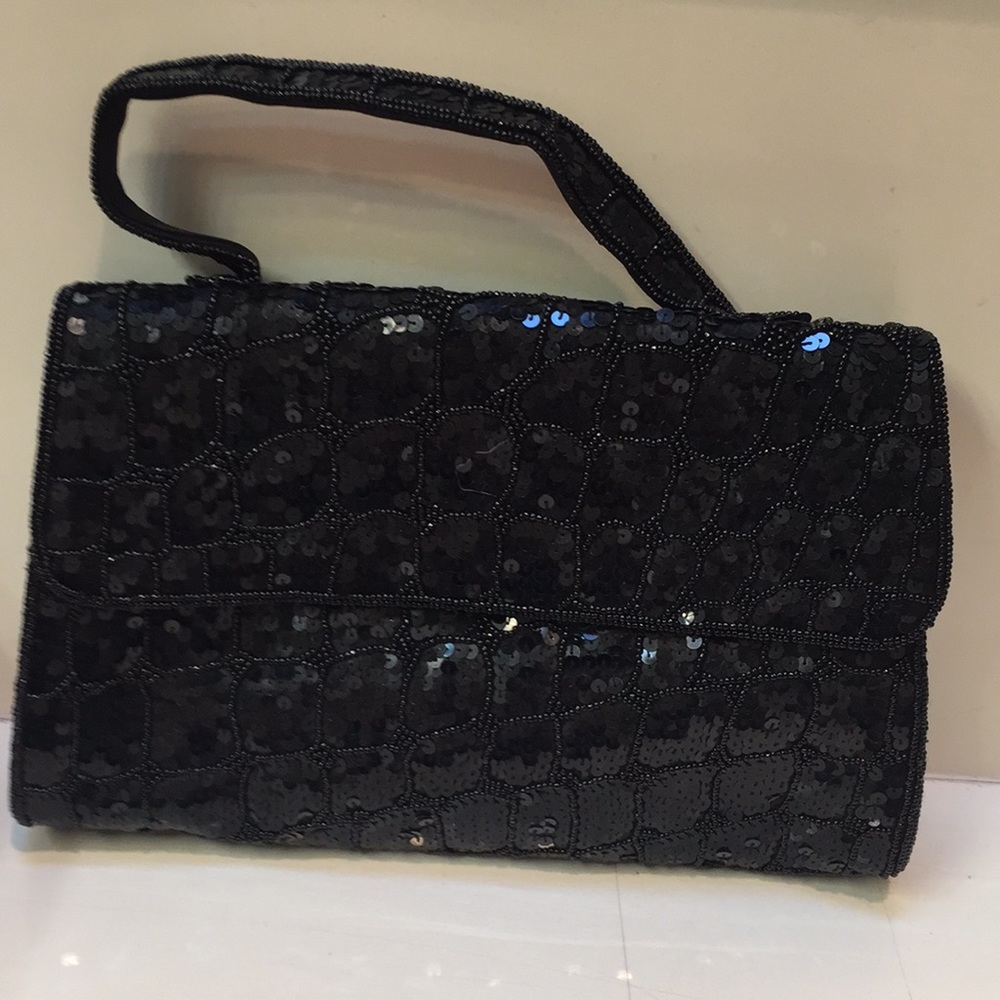 Handbag sequinned never used